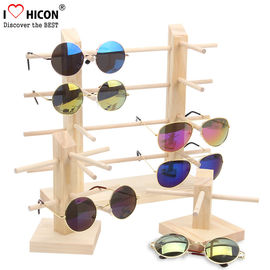 China Estante de exhibición de acrílico de la encimera/de madera impermeable colorido de las gafas de sol proveedor